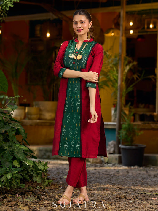 Elegant maroon cotton-silk kurta featuring a green Ikat patch and stand collar.