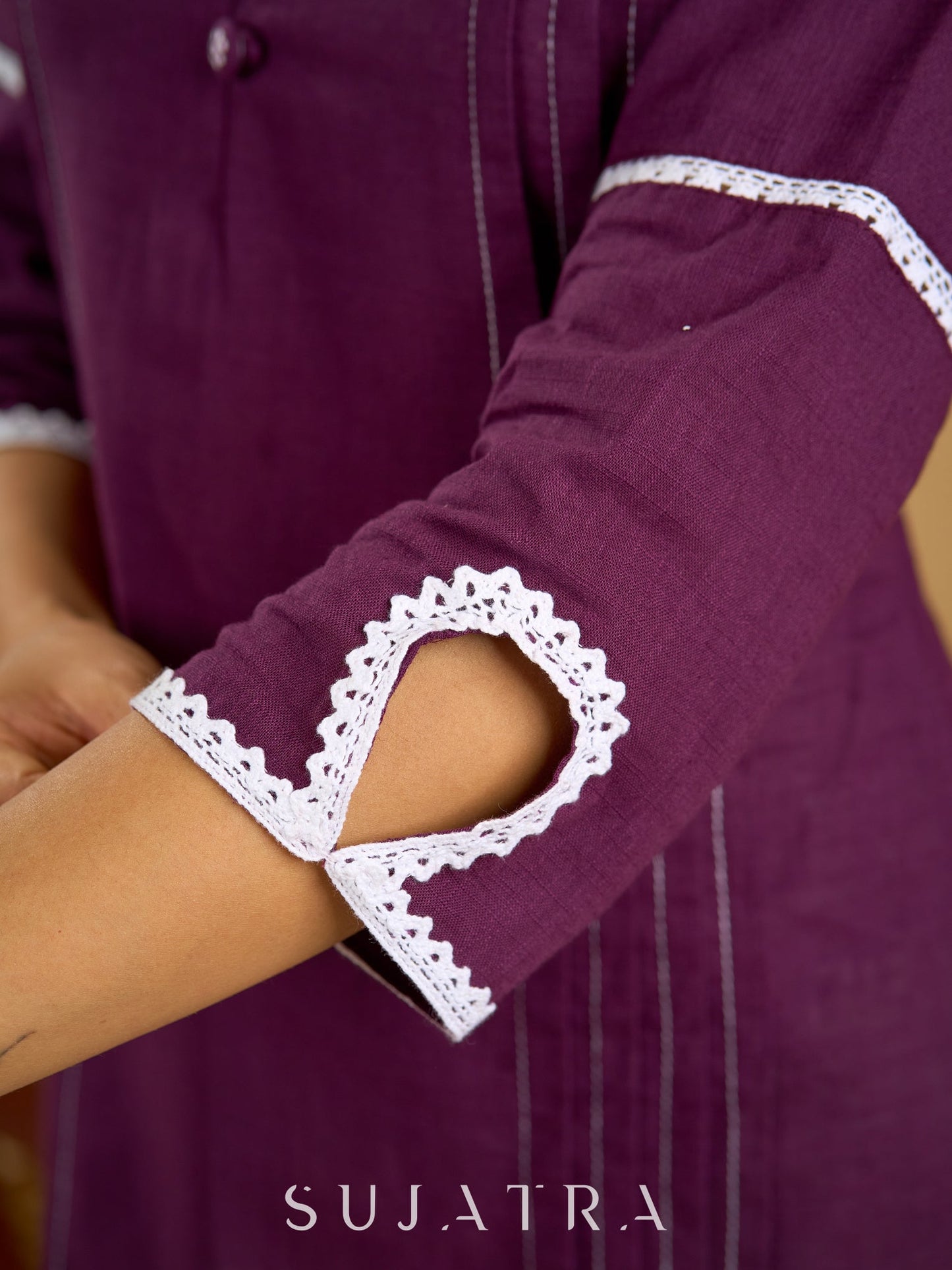 Elegant purple cotton top beautifully finished with delicate lace detailing
