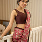Ivory elegance meets rich pink florals in this exclusive cotton saree