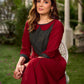Chic maroon dress featuring a contrasting teal neck patch with charming Peter Pan collar details