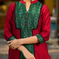 Elegant maroon cotton-silk kurta featuring a green Ikat patch and stand collar.