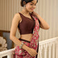 Ivory elegance meets rich pink florals in this exclusive cotton saree