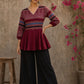 Bold and playful maroon hand block print peplum top with beige geometric motifs and subtle blue accents for effortlessly chic everyday style.