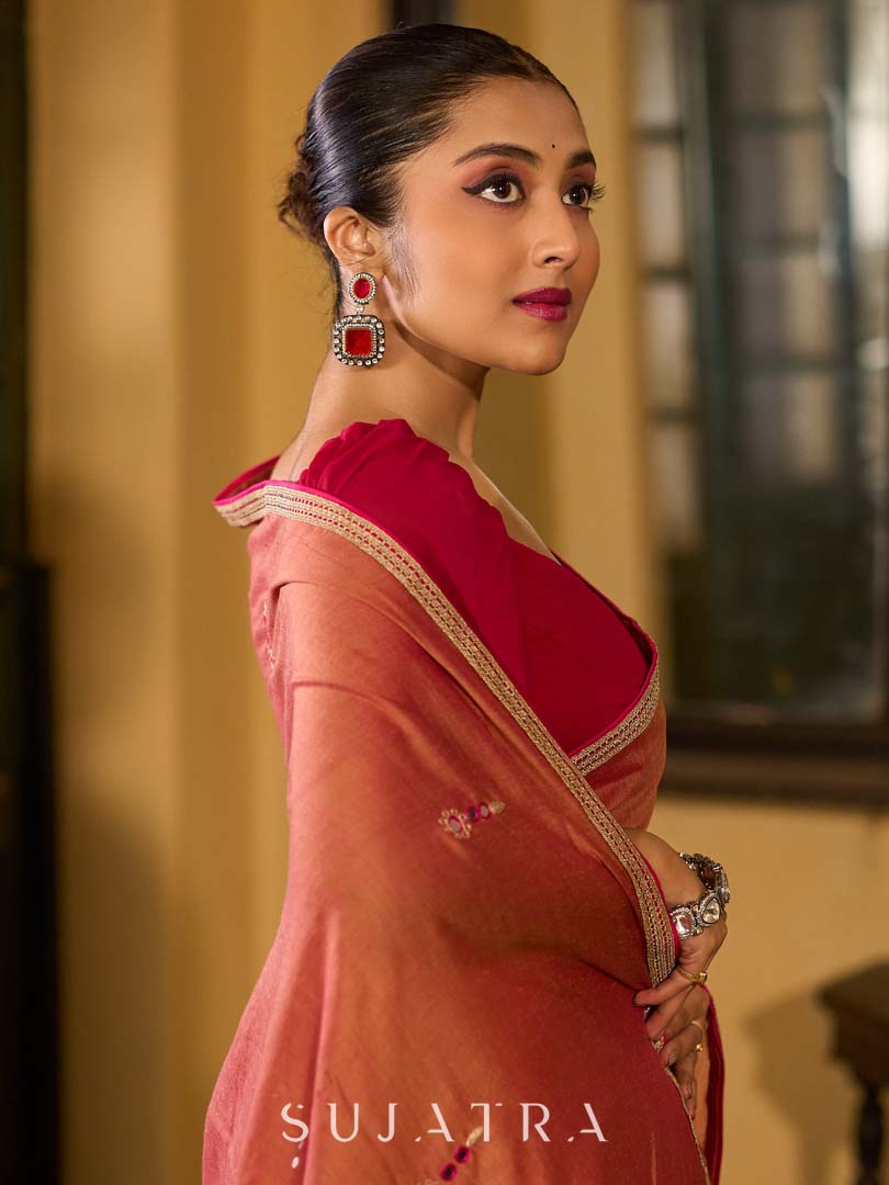 Warm Rust Saree with Fine Butti Embroidery and Classic Border Finish