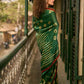 Bottle Green Shibori Art Silk Saree with Contrasting Red Bandhani Border