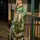 Muted Green Tussar Silk Saree with Delicate Floral Artwork and Classic Border