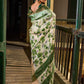 Muted Green Tussar Silk Saree with Delicate Floral Artwork and Classic Border