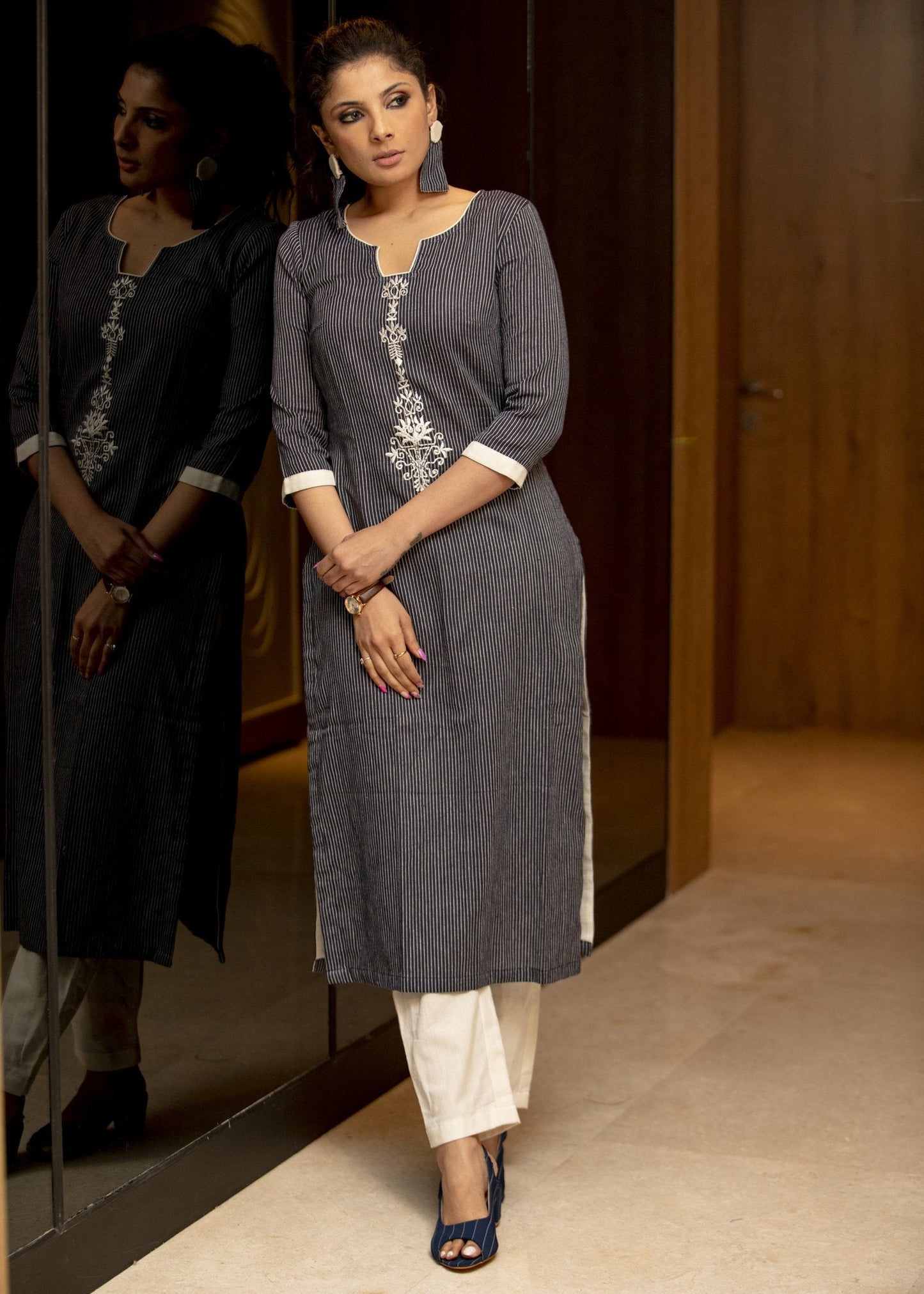 Navy blue pin striped straight cotton kurta with embroidery in front