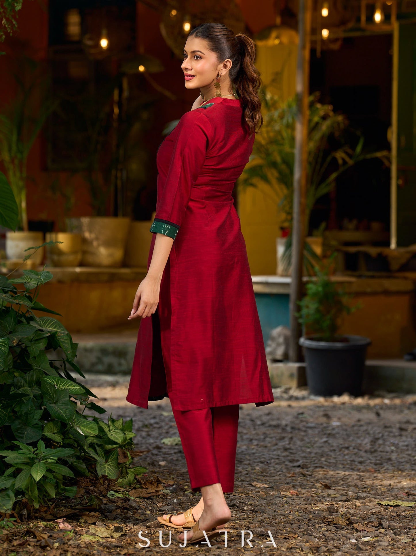 Elegant maroon cotton-silk kurta featuring a green Ikat patch and stand collar.