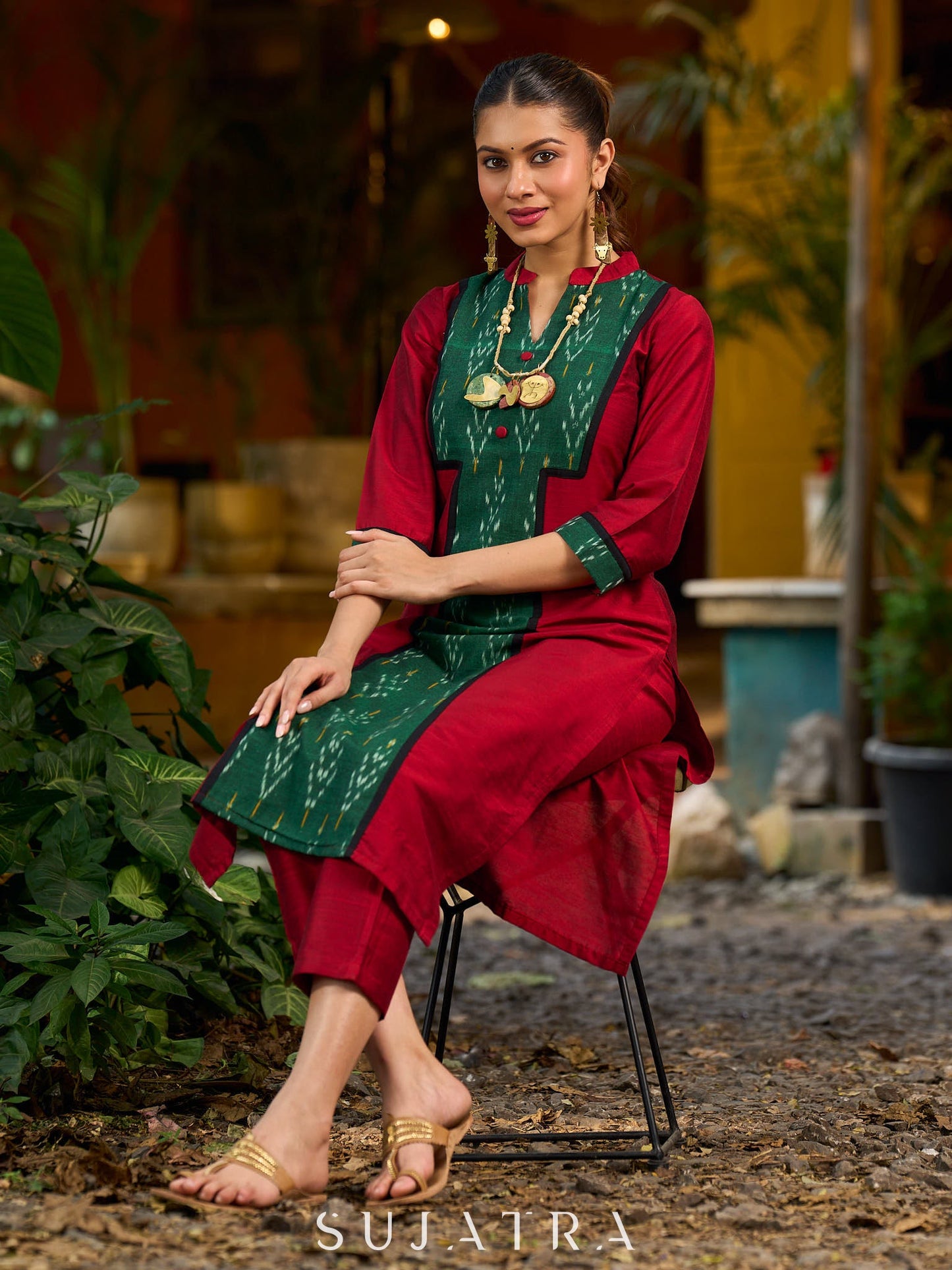 Elegant maroon cotton-silk kurta featuring a green Ikat patch and stand collar.