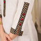 Graceful white cotton kurta with bold chevron block prints and intricate detailing