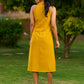 Exquisite Mustard Cotton Halter Dress Highlighted with Maroon Piping and Handcrafted Ajrakh Buttons - Jacket Optional