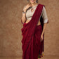 A delicate beige hue blouse with asymmetrical keyhole neckline to create a stunning piece for work or leisure.