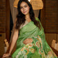 Handcrafted pure silk beauty in green with vibrant hand batik floral motif