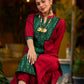 Elegant maroon cotton-silk kurta featuring a green Ikat patch and stand collar.