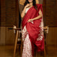 Artisanal crimson silk saree featuring heritage batik floral designs