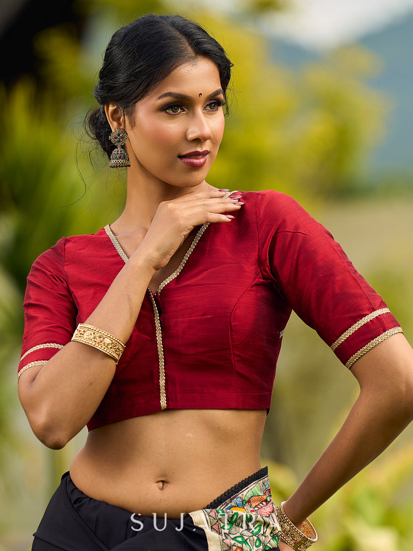 Striking Black Modal Saree with Hand-Painted Madhubani Pallu & Maroon-Blue Border
