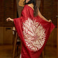 Artisanal crimson silk saree featuring heritage batik floral designs