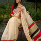 Elegant cream chanderi saree with subtle red border, featuring hand-painted Durga art