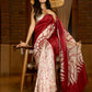 Artisanal crimson silk saree featuring heritage batik floral designs