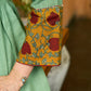 Green Artisan Cotton Top with Contrast Mustard Floral Printed Sleeves and Delicate Embellishments and Hand Embroidered Kantha