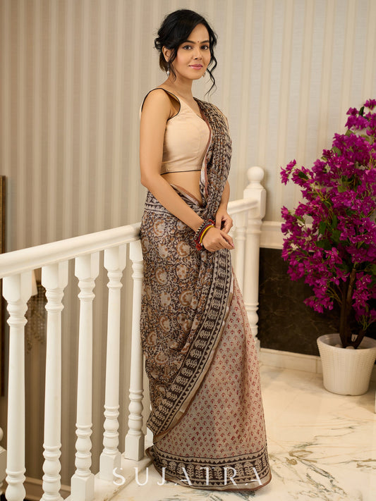 Rustic charm woven in earthy tones—hand block printed kota saree