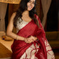 Artisanal crimson silk saree featuring heritage batik floral designs