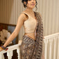Rustic charm woven in earthy tones—hand block printed kota saree