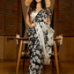 Artisanal black silk saree featuring intricate hand-drawn Kalamkari style motifs