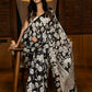 Artisanal black silk saree featuring intricate hand-drawn Kalamkari style motifs