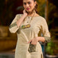 timeless cream kurta enhanced with handcrafted olive bandhani elements.