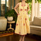 Yellow and white zebra-striped hand block printed sleeveless vintage luxe dress with maroon bird motifs and matching accents for a bold, elegant statement look.