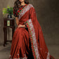Brown Rayon saree with delicate embroidery and Ajrakh border