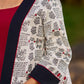 White Cotton Printed Jacket with Script Motifs and Black Trim Accents