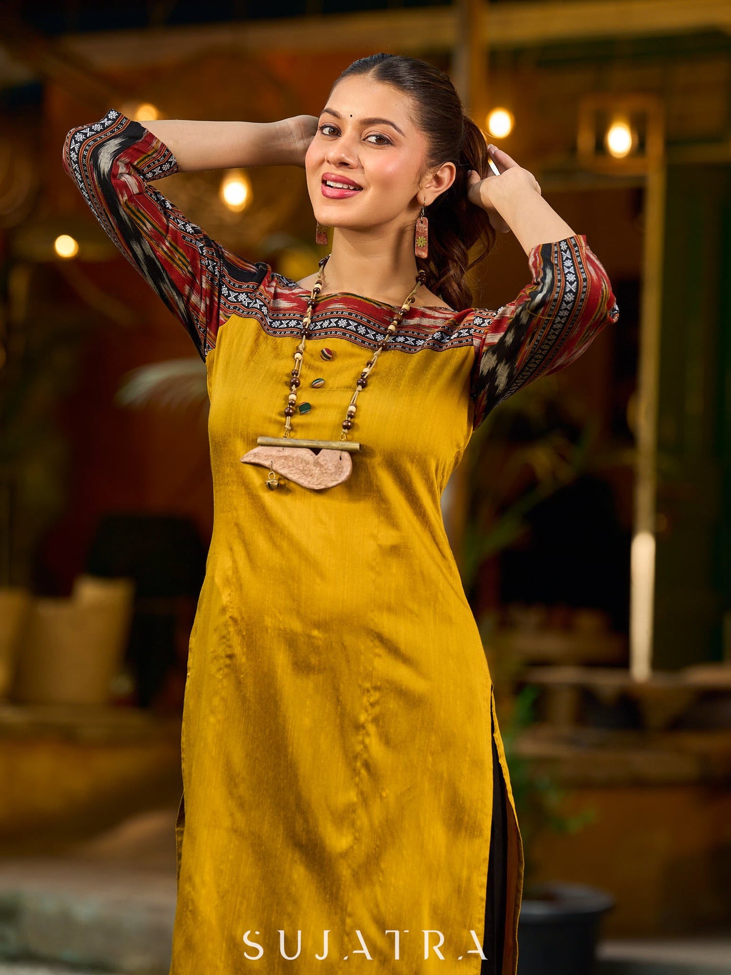 Stunning mustard cotton-silk kurta highlighted with black Ikat