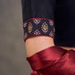Striking Black Cotton Silk Blouse with Ajrakh Printed Embroidered Yoke & Red Piping Detail