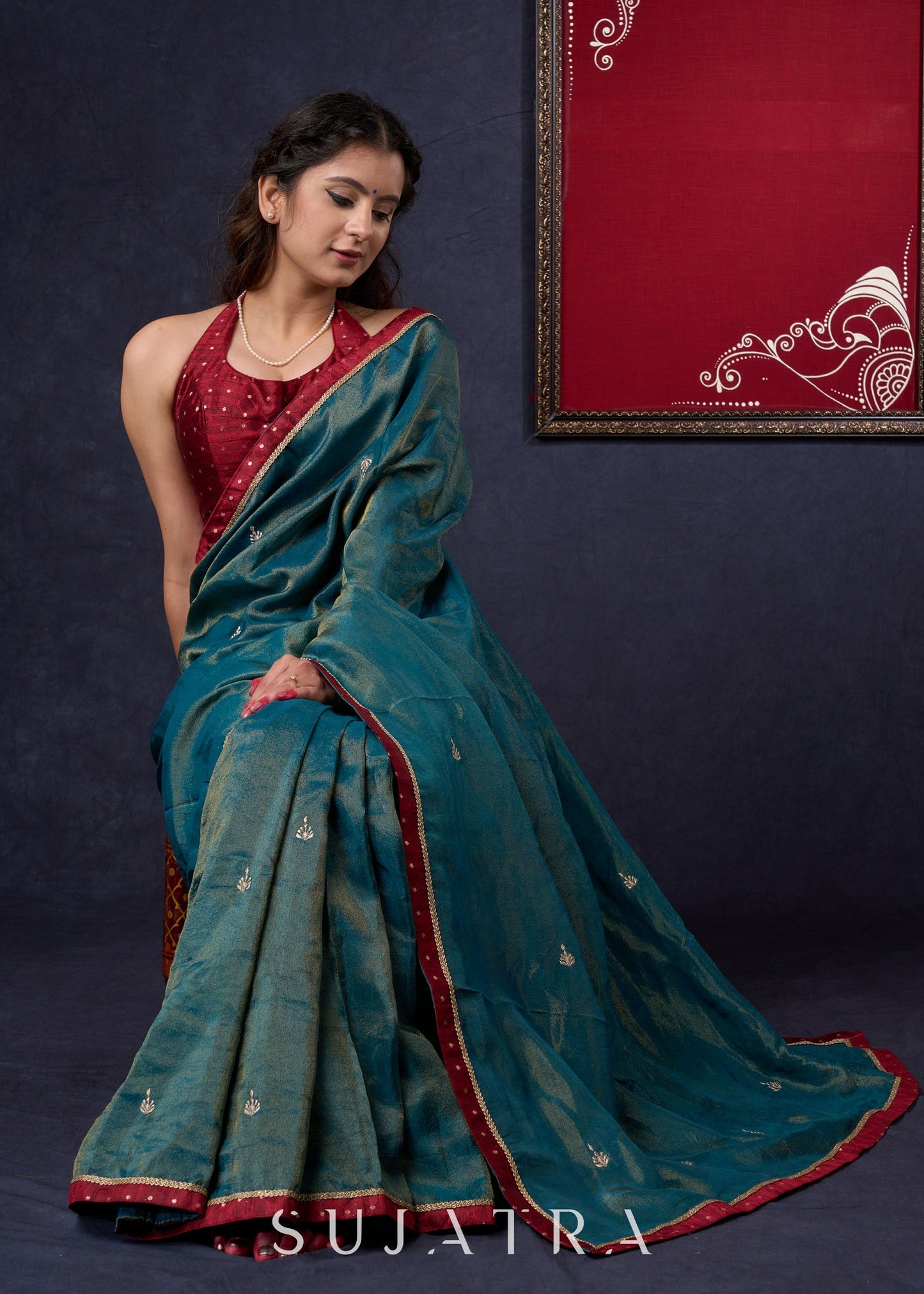 Exclusive Tissue saree with Golden Butta Work All-over Highlighted with Maroon Detailing