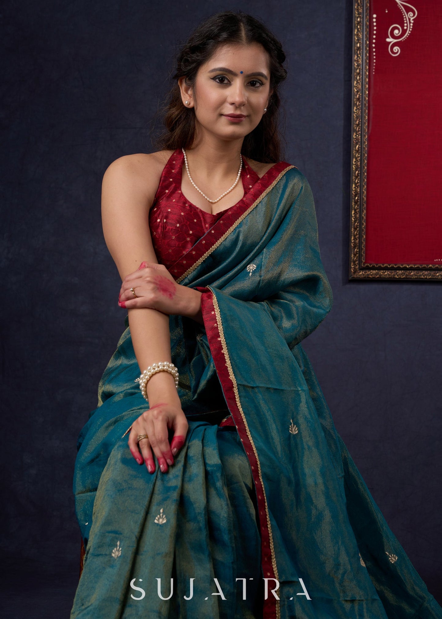 Exclusive Tissue saree with Golden Butta Work All-over Highlighted with Maroon Detailing
