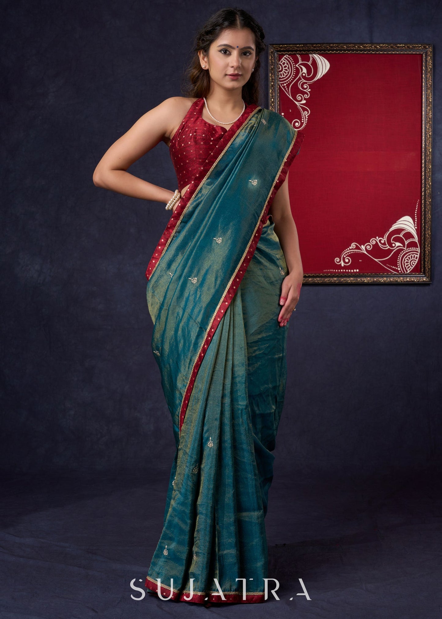Exclusive Tissue saree with Golden Butta Work All-over Highlighted with Maroon Detailing