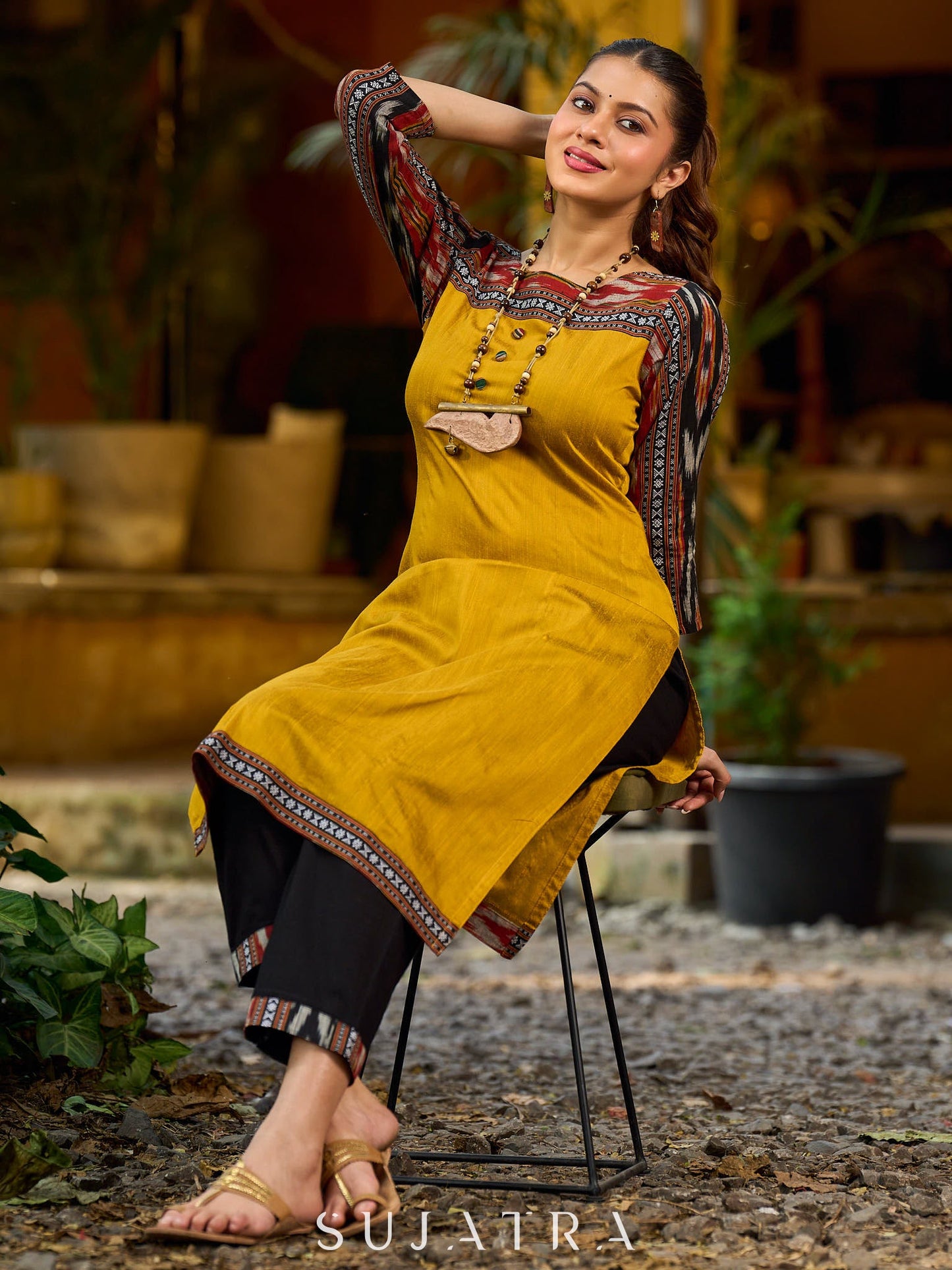 Stunning mustard cotton-silk kurta highlighted with black Ikat
