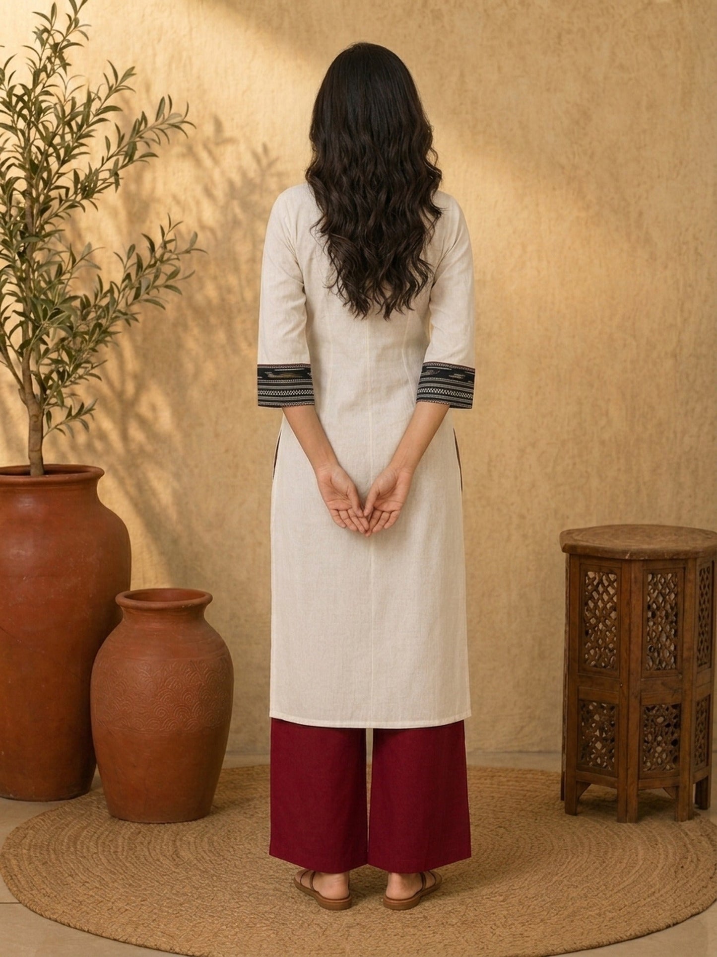Sophisticated Off-White Cotton Kurta with Ikat Placket Border & Sleeve Band