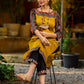 Stunning mustard cotton-silk kurta highlighted with black Ikat