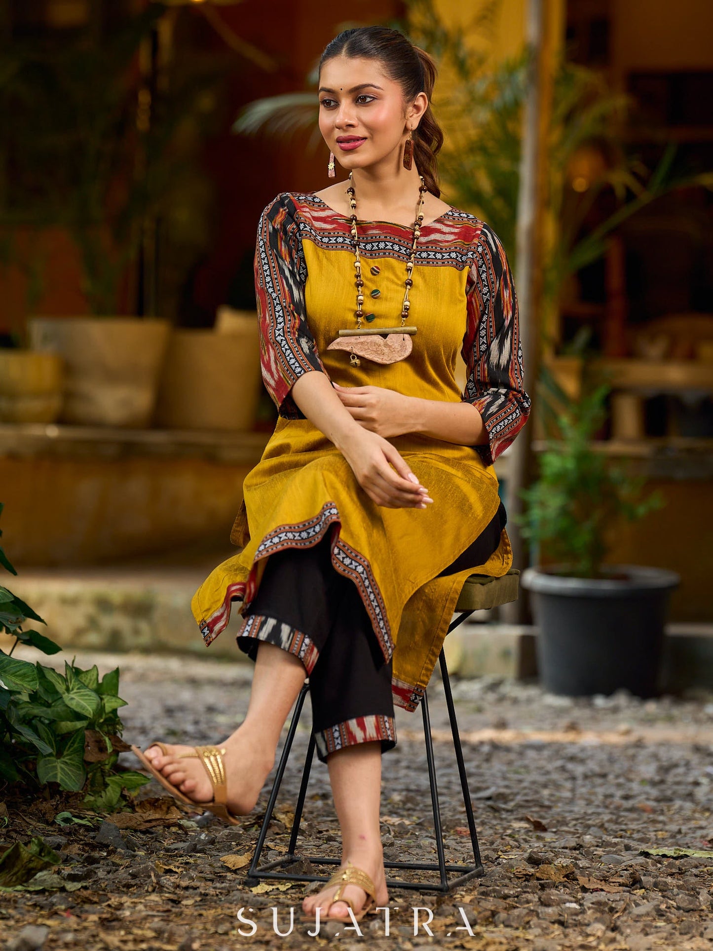 Stunning mustard cotton-silk kurta highlighted with black Ikat