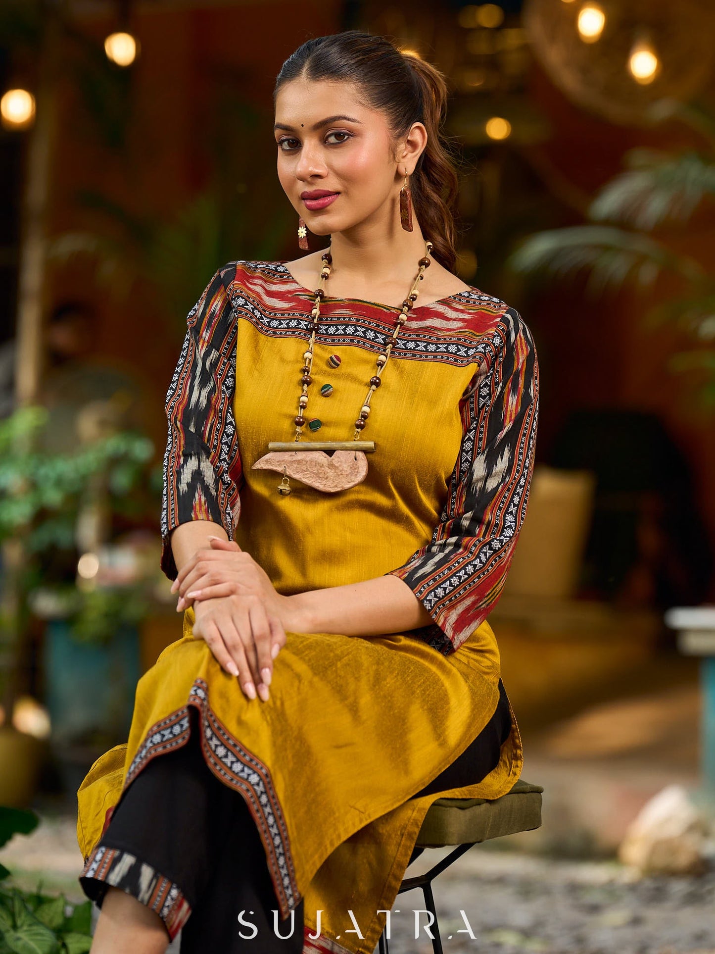 Stunning mustard cotton-silk kurta highlighted with black Ikat