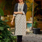 Timeless monochrome Ikat kurta enhanced with stripe details.