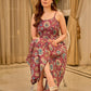 Playful wine floral summer dress elevated with dainty straps and pleats from the waistline