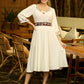Radiant Ivory Embroidered Flare Dress with Statement Belt