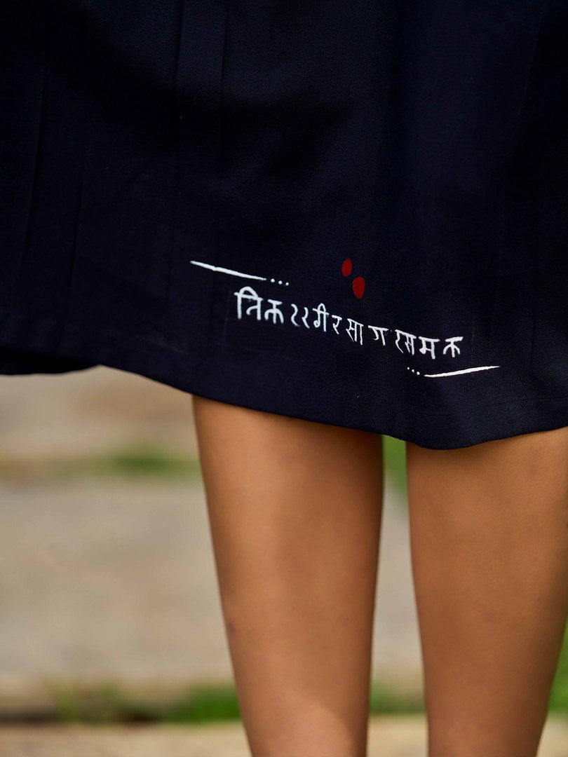 Graceful Black Rayon Pleated Dress with Script Art and Painted Hemline
