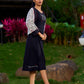 Graceful Black Rayon Pleated Dress with Script Art and Painted Hemline