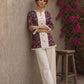 Deep red Jaipur floral printed top featuring maroon pintuck yoke, off-white panel, and scalloped lace detailing.